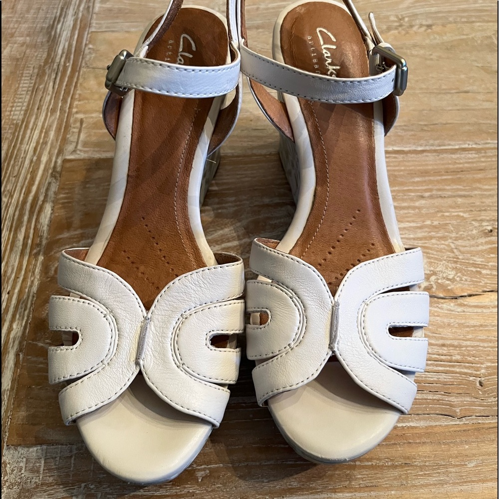 Clarks artisan white wedge leather sandal. Beautiful pattern on side. Size 8.